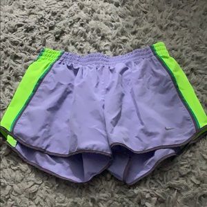 Purple with lime green Nike shorts
